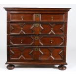 A Charles II oak chest of drawers, circa 1680 With a twin-boarded top, over four long drawers,