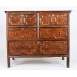 A William & Mary oak chest of drawers, circa 1690 With a typical thin boarded top, having two