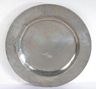 An interesting William & Mary pewter semi broad-rim charger, circa 1690 The plain rim engraved