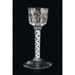 An 18th Century cordial glass, circa 1750 The squat bowl engraved with a tree with oversized