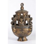 A late 19th century gilt bronze incense burner and cover Of archaic form, the spherical cup and