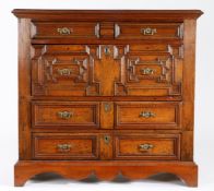 A Charles II oak chest of drawers, circa 1680 and later The top of two boards with applied moulded