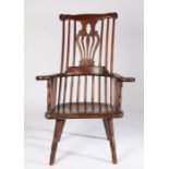 A good mid-18th century ash and elm primitive Windsor armchair, circa 1770 Having a bold fretwork