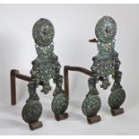 A striking pair of cast iron and so-called ‘Surrey' enamel andirons, English, in the circa 1680-80