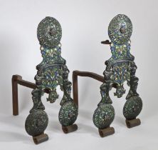 A striking pair of cast iron and so-called ‘Surrey' enamel andirons, English, in the circa 1680-80