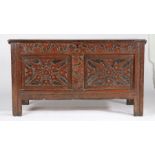 A Charles II oak and black-stained coffer, Somerset, circa 1670 Having a twin-boarded hinged lid,