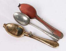 A mid-18th century bronze spoon mould, typically in two-parts With pouring hole to one end; together