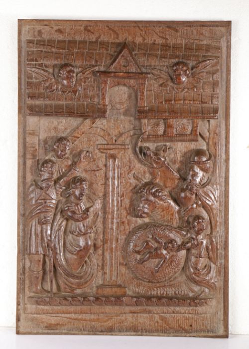 An interesting early 17th century carved oak panel, circa 1600-20 Designed as The Nativity, the