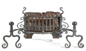 An iron fire basket Having a bowed front of upright bars, on scrolling andiron-style supports with