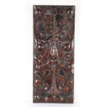 An early 17th century yew carved panel, French, circa 1600-30 Designed with a coat of arms,