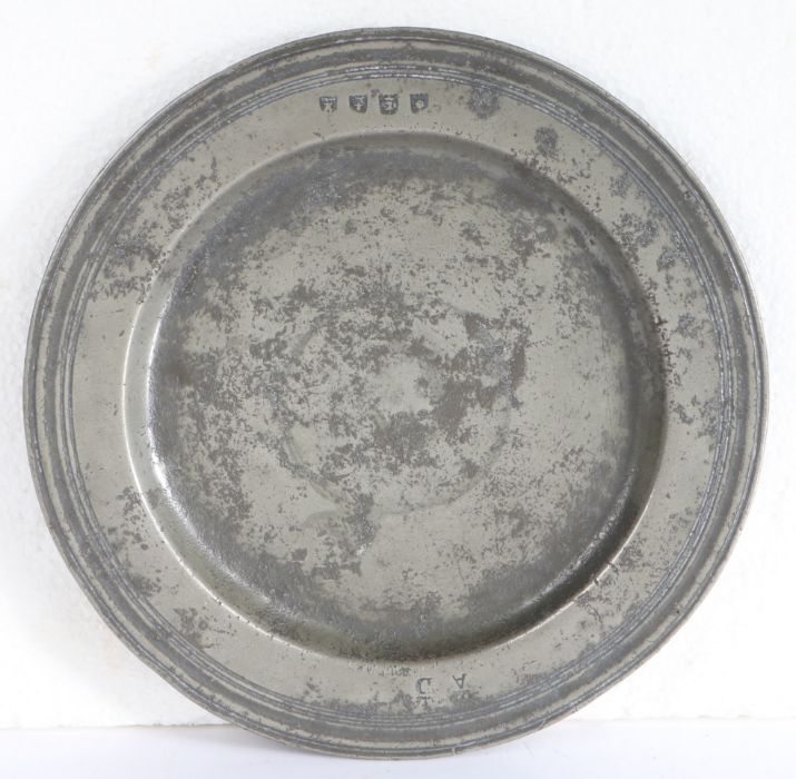 A late 17th century pewter multi-reed plate, English, circa 1685 With crowned ownership initials ‘