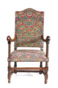 An attractive 17th century fruitwood and needlework upholstered open armchair, Flemish, circa 1680-