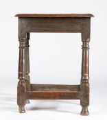 A Charles I oak joint stool, circa 1640 Having a six-pegged top with reeded and ovolo-moulded