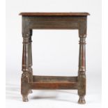 A Charles I oak joint stool, circa 1640 Having a six-pegged top with reeded and ovolo-moulded