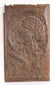 A 16th century walnut Romayne-type panel, circa 1540 Carved with the profile of a bearded gentleman,