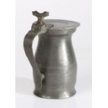 A pewter OEWS quart bud baluster measure, English, circa 1720-40 Having incised lines to lid and