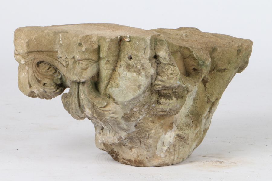 A limestone capital, probably 13th century Designed with a grotesque 'lion' mask issuing acanthus - Image 2 of 2