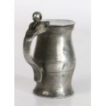 A pewter OEWS half-gill ball-and-bar baluster measure, English, circa 1700 The plain lid with