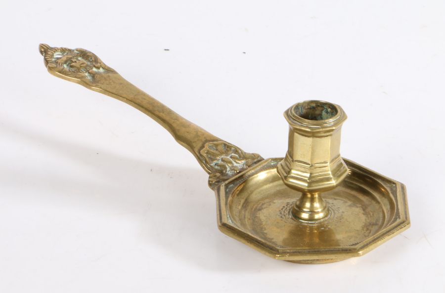 A cast brass chamberstick, French Having an octagonal socket and pan, mask terminal to handle, - Image 2 of 2