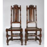 A pair of William & Mary oak and elm high-back side chairs, circa 1690 Each with a slender fielded