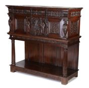 An Impressive and rare Elizabeth I joined oak standing livery cupboard, circa 1600 Having a