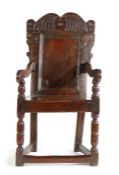An interesting Charles I joined oak panel back open armchair, Yorkshire, Circa 1630 The double-