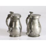 Two pewter OEWS gill double-volute baluster measures, English, circa 1770 One with a slightly