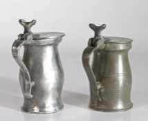 Two pewter OEWS gill bud baluster measures, English, circa 1720-40 Both with incised lines to flat