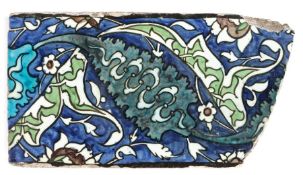 A 16th century border tile, Damascus, Syria, circa 1560 Designed with arabesques, tendrils and
