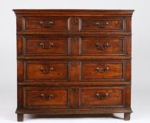 A rare William & Mary elm chest of drawers, circa 1690 The top principally formed from one well-