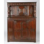 A small Charles I oak court cupboard, West Country, circa 1640 Having a top of two thin boards