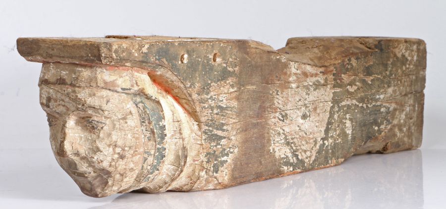 A rare 14th century polychrome-decorated beam end, circa 1350 Designed with the head of a women
