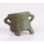 A miniature or toy bronze alloy cauldron, English, possibly 14th/15th century With flared rim,