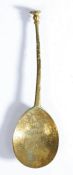 An Elizabeth I latten seal-knop spoon, probably London, circa 1600 Having a slender tapering and