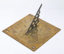 A 19th century brass engraved sundial, English With decorative gnomon, the square back plate