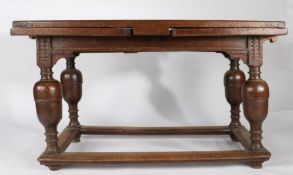 A mid-17th century oak draw-leaf table, Flemish, circa 1650 Having a fully cleated triple-boarded