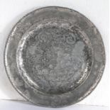 An early 18th century pewter single-reed and wrigglework plate, English, circa 1705-30 Designed with