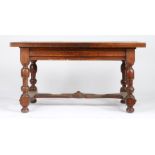 A walnut draw-leaf table, French, circa 1800 Having a fully-cleated twin-plank top, a draw-leaf to