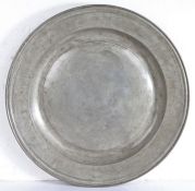 A Late 17th century large pewter multi-reeded dish, Wigan or Bewdley, circa 1685 The rim with