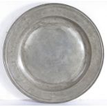 A Late 17th century large pewter multi-reeded dish, Wigan or Bewdley, circa 1685 The rim with