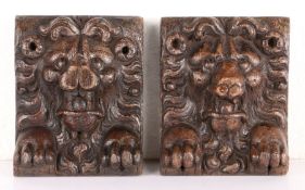 Two Elizabeth I/James I oak lion mask mounts, circa 1600 Each with open mouth, flowing mane, unusual