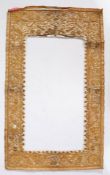 An early 20th century Anglo-Indian embroidered mirror or picture frame panel The elaborate border of