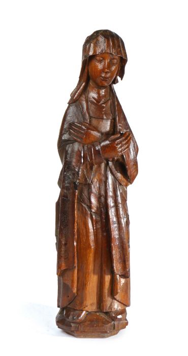 A rare mid-15th century carved oak figure of Mary Magdalen, probably Norfolk or Suffolk, circa