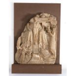 A 15th century alabaster panel of The Crucifixion Designed with Christ on the cross, attended by