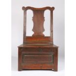 An early 18th century oak box-seat low side chair, English, circa 1720 Having a broad and solid