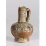 A small late 16th century pottery Bellarmine-type jug, German, probably Raeren, circa 1550-80 Of