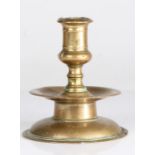A mid-17th century brass socket candlestick, North-West European, circa 1640 The bold straight-sided