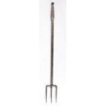 A George III steel meat fork, circa 1780-1800 Wiith three slightly curved tines, the straight-