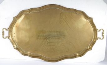 An exceptionally large and rare mid-18th century brass tray, English, circa 1750 Of oval