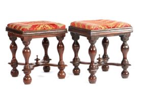 A rare pair of William and Mary yew wood stools, circa 1690  Each with a drop-in padded seat,